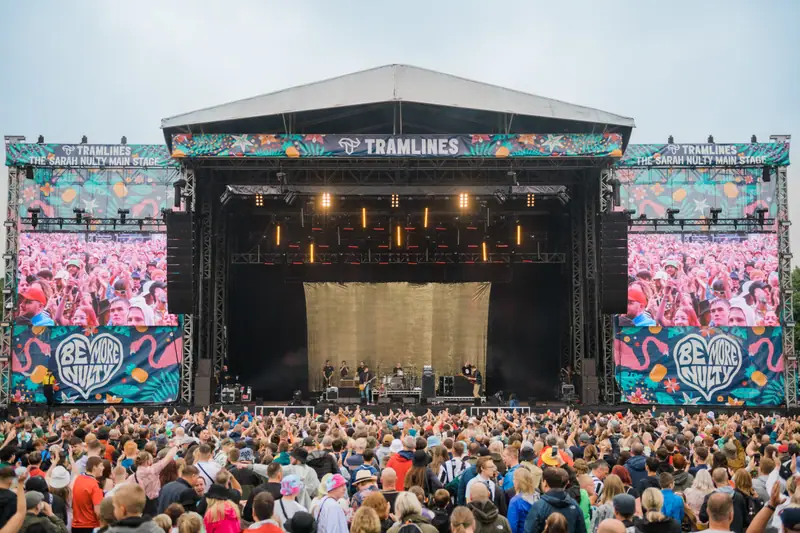 A packed crowd in front of the main stage at Tramlines festival