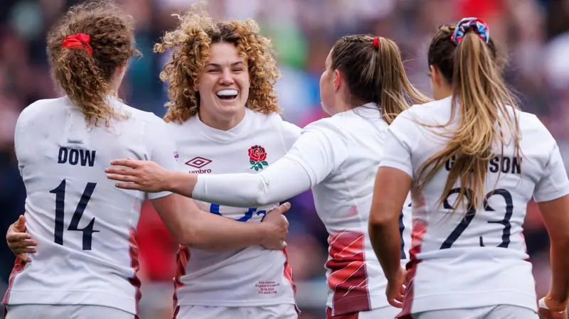 England players celebrating together at the Women’s Rugby World Cup 2025